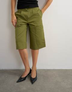 Model wearing Longline bermuda short in khaki