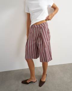 Model wearing Longline bermuda short in stripe