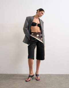 Model wearing Longline cargo short in black