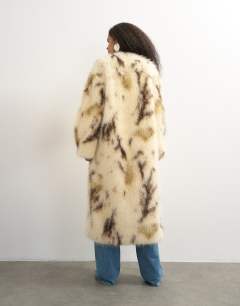Model wearing Longline faux fur coat in cow
