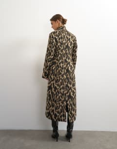 Model wearing Longline formal coat in animal print