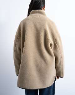 Model wearing Longline high neck chuck on shearling in teddy