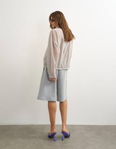 Model wearing Longline jersey short in grey