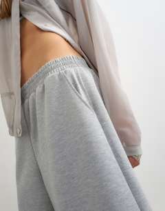 Model wearing Longline jersey short in grey