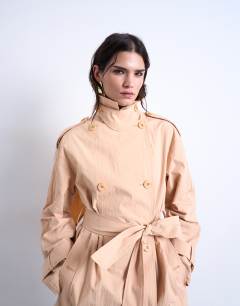 Model wearing Longline nylon mac in peach