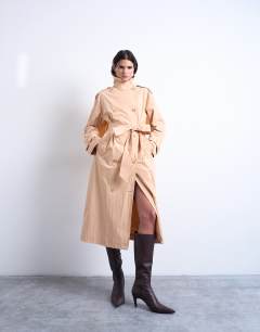 Model wearing Longline nylon mac in peach