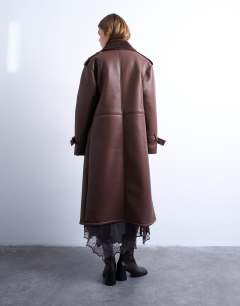 Model wearing Longline oversized aviator borg coat in chocolate
