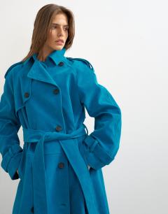 Model wearing Longline oversized faux suede trench coat in blue