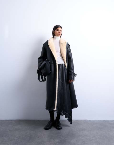 Topshop – Longline-Pilotenmantel in Schwarz und Cremeweiß mit Oversize-Schnitt und Teddyfell - view 1