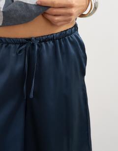 Model wearing Longline satin short in navy