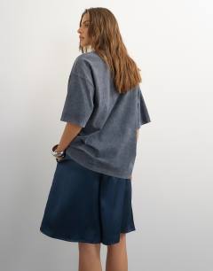 Model wearing Longline satin short in navy