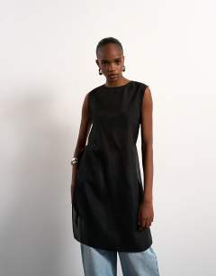 Model wearing Longline sheer organza tunic in black