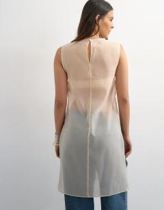 Model wearing Longline sheer organza tunic in oyster