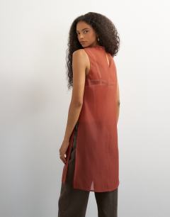 Model wearing Longline sheer organza tunic in rust