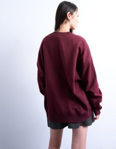 Model wearing Longline sweat in burgundy