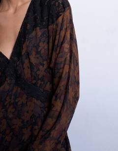 Model wearing Longsleeve lace trim mini tea dress in dark based floral