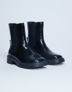 Model wearing Lottie chelsea ankle boot in black