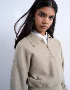 Model wearing Lounge zip top in light khaki