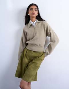 Model wearing Lounge zip top in light khaki