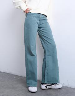 Model wearing Low rise flared trouser in blue 