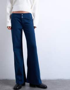 Model wearing Low rise flared trouser in navy