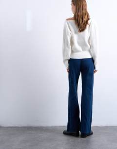 Model wearing Low rise flared trouser in navy