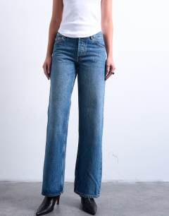 Model wearing Low rise straight leg jean in vintage blue