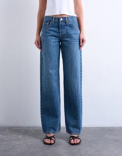Model wearing Low rise straight leg jean in vintage blue