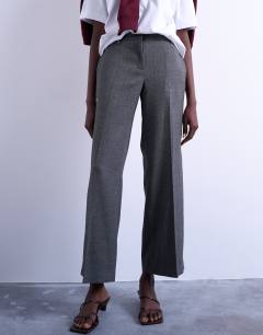 Model wearing Low slung slouchy straight leg trouser in grey