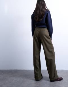 Model wearing Low slung tailored trouser in green heritage check