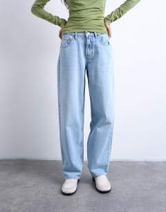 Model wearing Lowrie low rise baggy jean in bleach