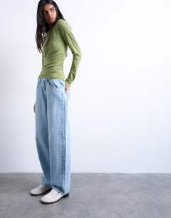 Model wearing Lowrie low rise baggy jean in bleach