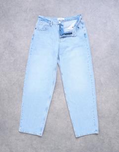 Model wearing Lowrie low rise baggy jean in bleach