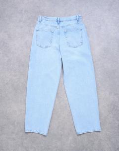 Model wearing Lowrie low rise baggy jean in bleach