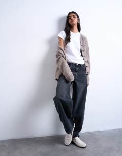 Model wearing Lowrie low rise baggy jean in washed black