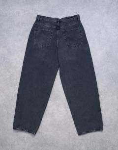 Model wearing Lowrie low rise baggy jean in washed black