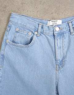 Model wearing Lowrie low rise baggy jeans in bleach