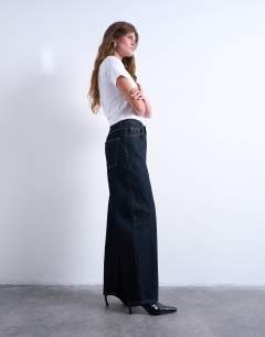 Model wearing Lowrie low rise baggy jeans in indigo rinse