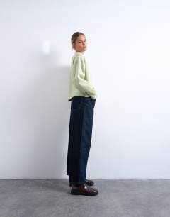 Model wearing Lowrie low rise baggy jeans in indigo rinse