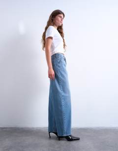 Model wearing Lowrie low rise baggy jeans in mid blue