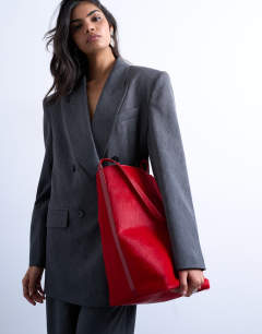 Model wearing Luna hair on real leather tote bag in red