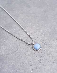 Model wearing Madison stainless steel pendant necklace in silver