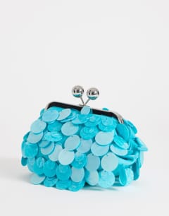 Model wearing Maeve small embellished grab bag in turquoise