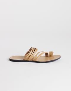 Model wearing Maeve strappy toe loop sandal in camel