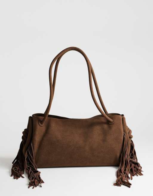 asos leather backpack with oversized tassel Topshop Maisie large shoulder bag with real leather tassels in chocolate