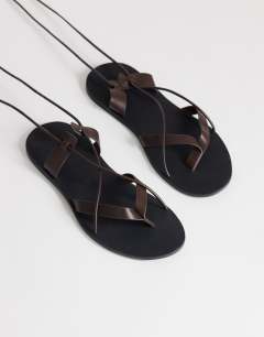 Model wearing Maisie strappy flat sandal in chocolate