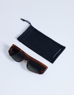 Model wearing Malta visor large sunglasses in brown