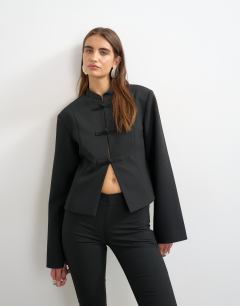 Model wearing Mandarin collar blazer in black