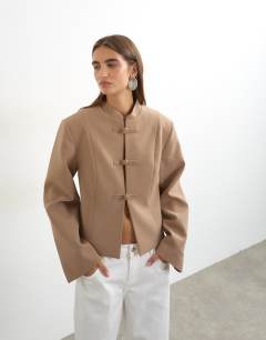Model wearing Mandarin collar blazer in brown