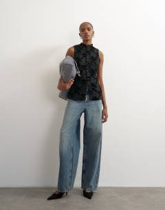 Model wearing Mandarin lace velvet mix button down longline top in black